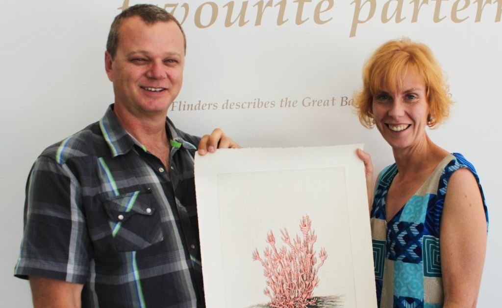 Claire Hanratty, managing director of the Great Barrier Reef Foundation, presents SCU's Dr Steve Whalan his $10,000 research prize and an original Vera Moller print of an imaginary marine life form. Claire Hanratty, managing director of the Great Barrier Reef Foundation, presents SCU's Dr Steve Whalan his $10,000 research prize and an original Vera Moller print of an imaginary marine life form.